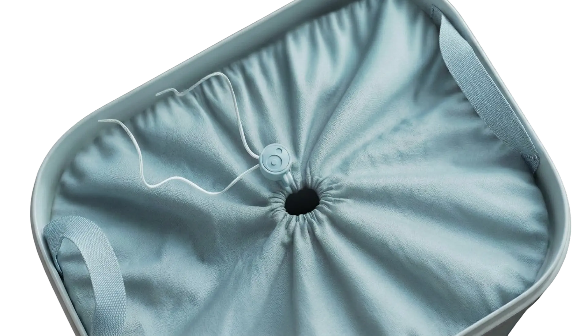 Close-up of the debossed OmniCore cord lock on Fello's cinched opening